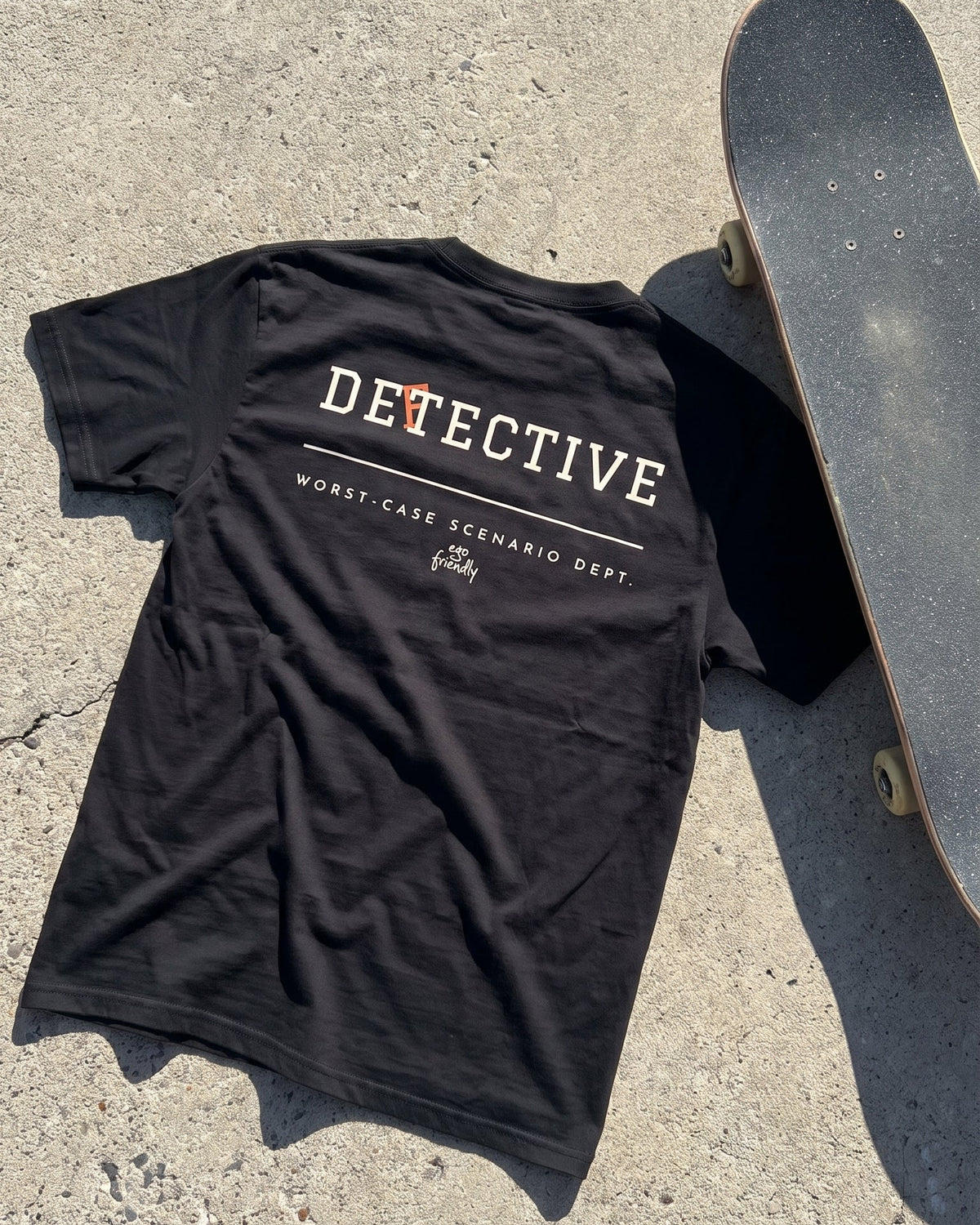 Detective, Worst-Case Scenario Dept. Back Print Tee | Funny Overthinking Shirt (Black)