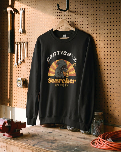 Cortisol Searcher sweatshirt, on a hanger